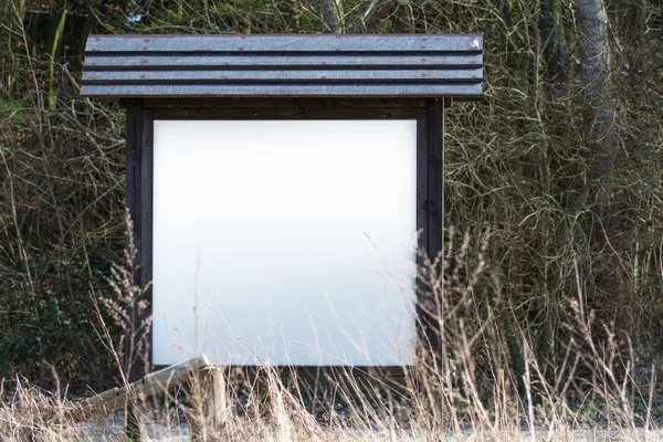 Blank information board in the nature with  space for your text
