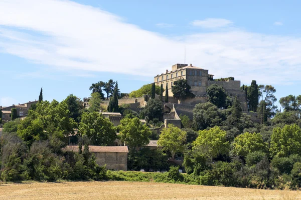 Historic castle and village on the hill, Ansouis in south of Fra