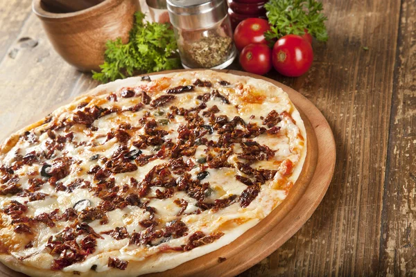 Italian super delicious mixed Dried tomatoes and olive pizza