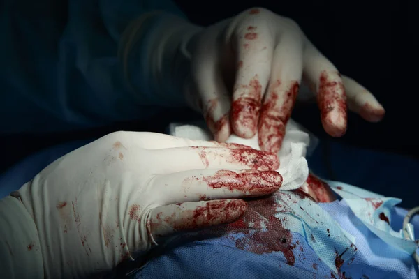 Working Surgeon's Hands Close-Up