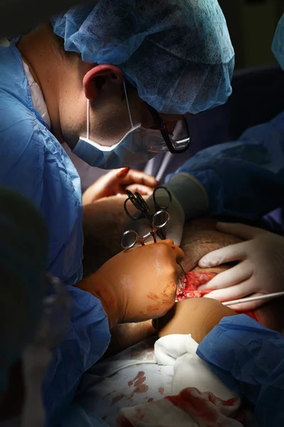 Surgeon operates
