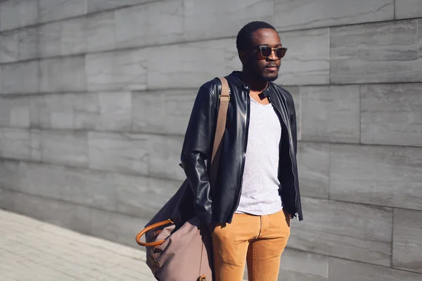 Street fashion concept - stylish handsome african man standing i