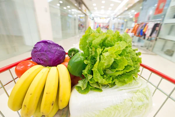 Shopping cart with fruits and Vegetables