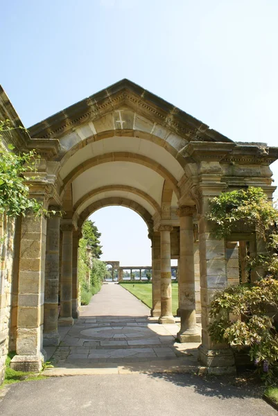 Archway. archways leading to a lake. Hever castle garden, Kent, England