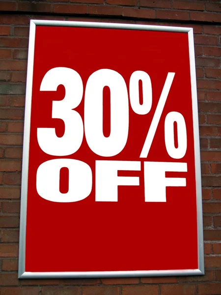 Red sale sign. sale sign. thirty percent off. store\'s sign