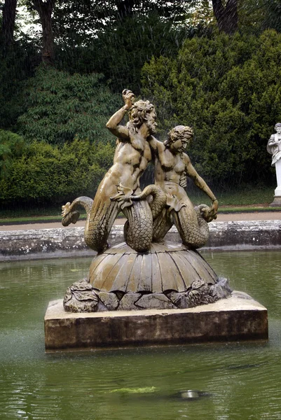 Sculptured men mermaids fountain, Buckinghamshire, England