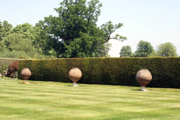 Italian terracotta containers, Hever castle garden, Kent, England