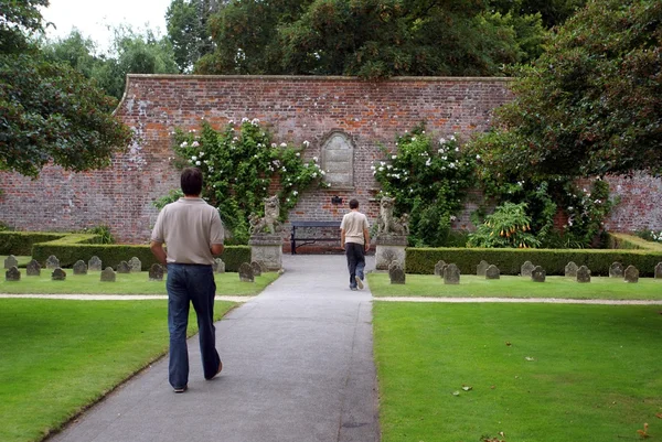 People visiting a pet cemetery or a pet graveyard