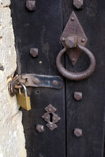 Old door lock. key lock on an old wooden door