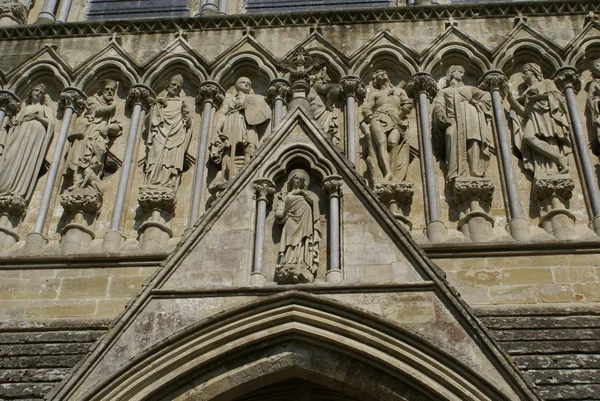 Statues in alcoves. sculptured facade, Salisbury Cathedral, Wiltshire, England