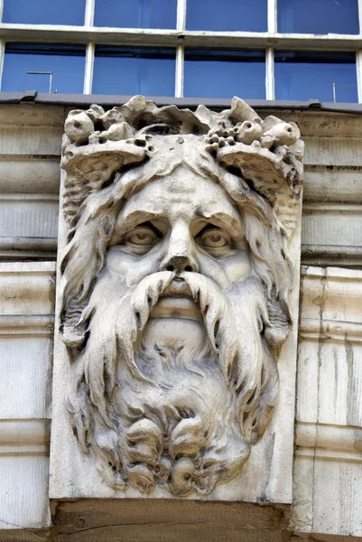 The gate sculpture of HM Treasury, The Exchequer, The Treasury in Whitehall, London, England