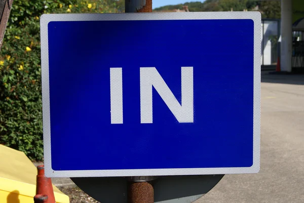 Road sign. In sign. way in