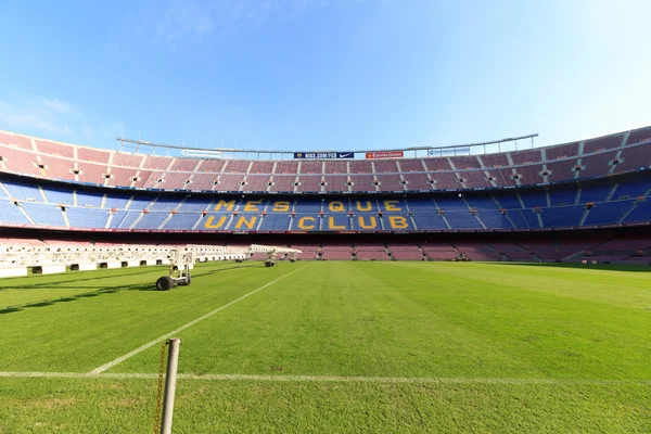 Football stadium Camp Nou interior with grass field, grow lighting and stands in Barcelona
