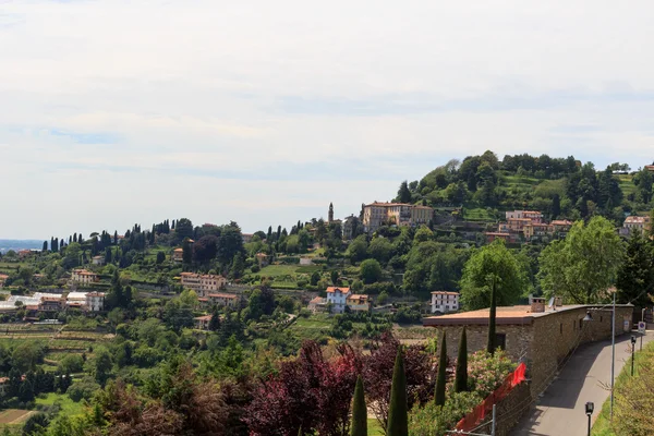 View from park in Citta Alta to hill San Vigilio panorama in Bergamo, Italy