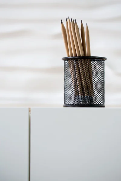 Lead pencils in metal pot