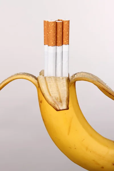 Cigarettes in a banana, smoker, bad teeth