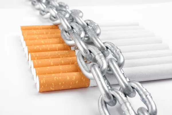Chained cigarettes. Conceptual image.