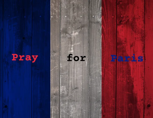 French flag on grunge Wood wall background. Pray for Paris.