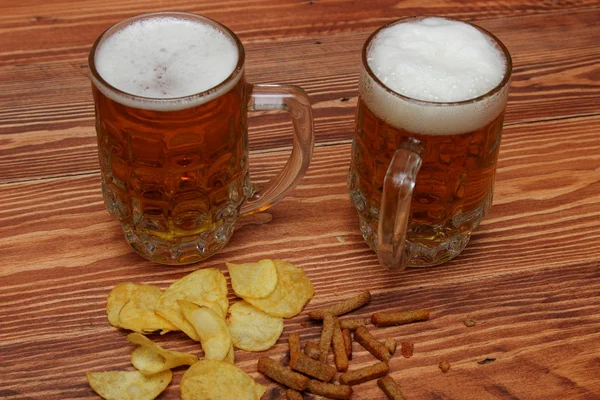 Mug of light beer on the table