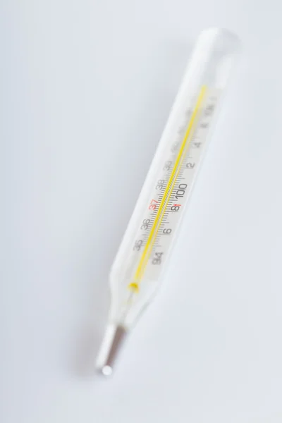 Close up of glass tube and mercury thermometers