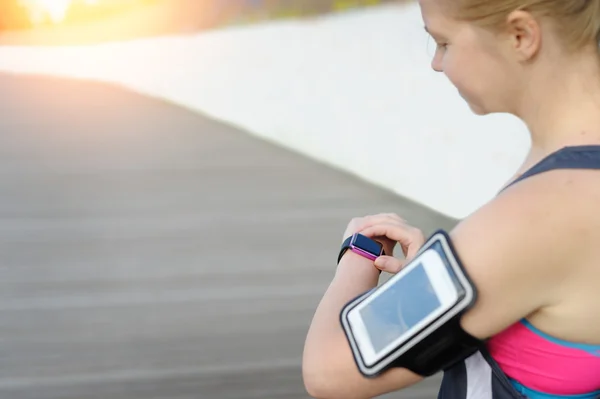 Watch for sports with smartwatch. Jogging training for marathon.