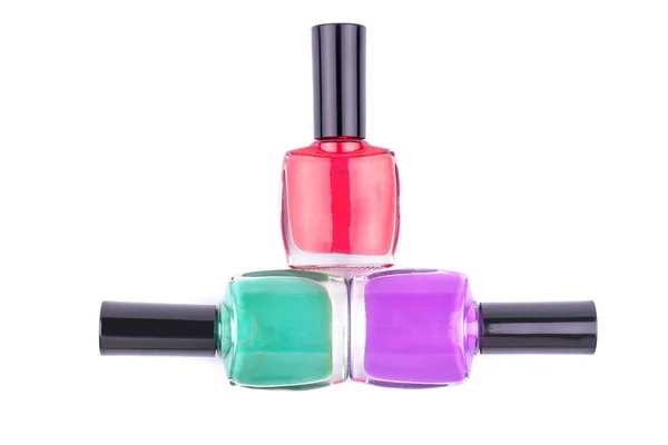 Three multi-colored nail polish