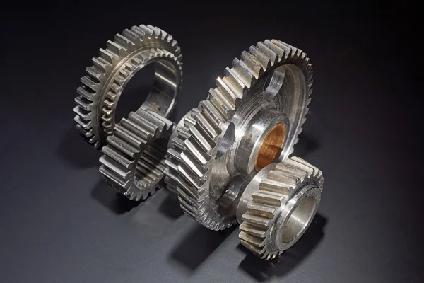 Standing gears on a black background