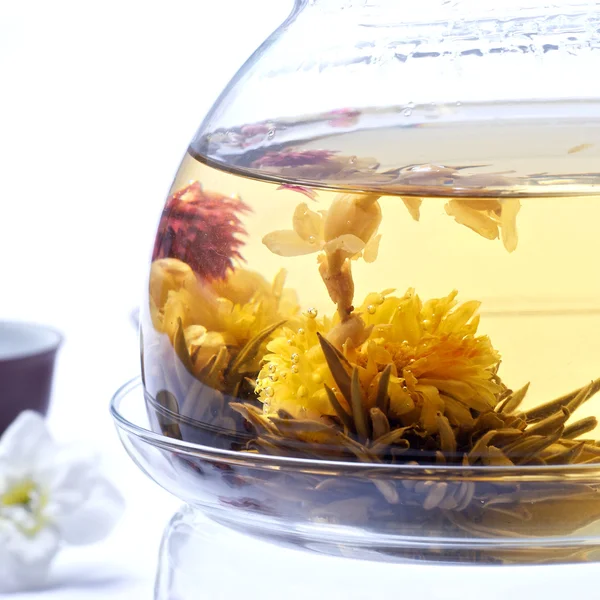 Silver needle tea jasmine with detail of flowers