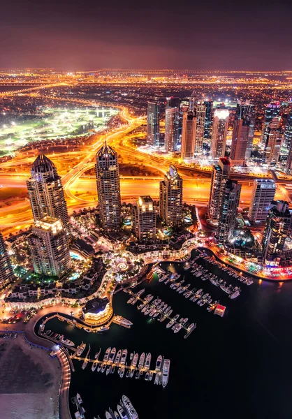 Majestic colorful dubai marina skyline during night. Multiple tallest skyscrapers of the world. Dubai marina, United Arab Emirates.