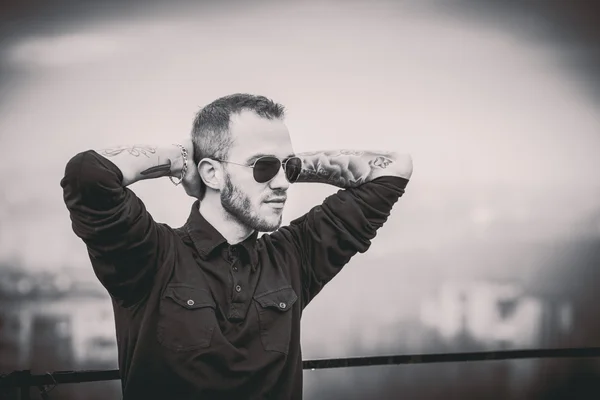 Man on the roof of the high building