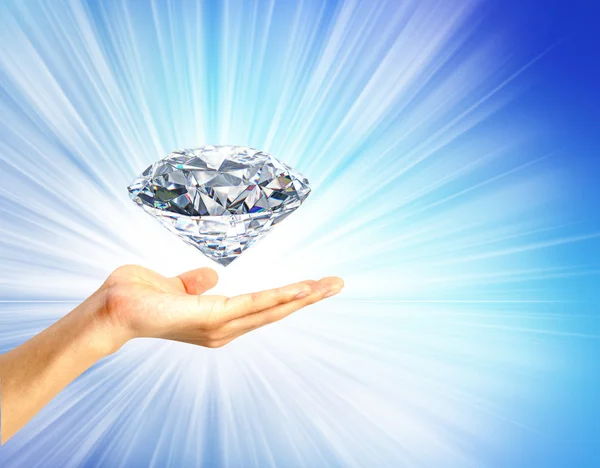 Bright picture of hand with big diamond. Concept most precious b