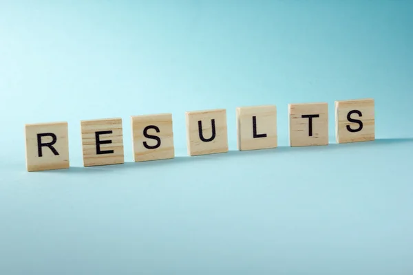 Results word on blue. Succeed business success, be a winner in  elections, pop poll or sports test,  report, election result. Counting losses and profit, analyzing financial statistics