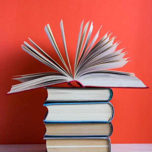 Back to school, vintage old hardback books, diary with fanned pages