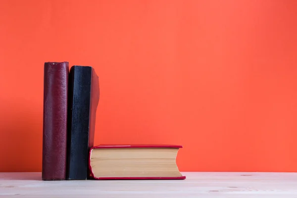 Composition with vintage old hardback books, diary, fanned pages