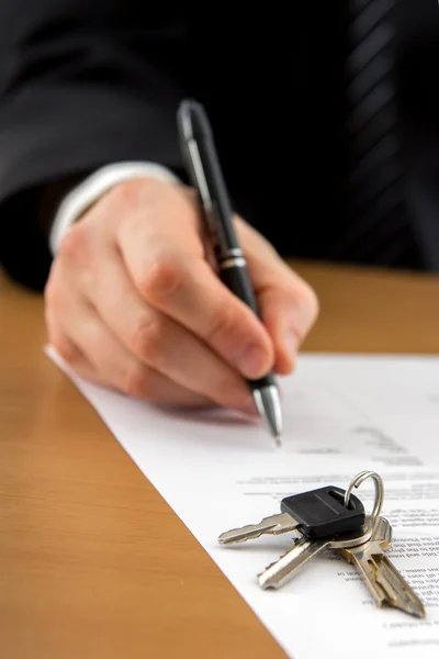 Hands signing business documents. Signing papers. Lawyer, realto