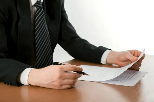 Businessmans hand signing papers. Lawyer, realtor, businessman