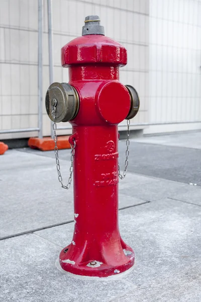 MILAN, ITALY OCTOBRE 20, 2015: New red water pump for fire fighting, fire hydrant in the city