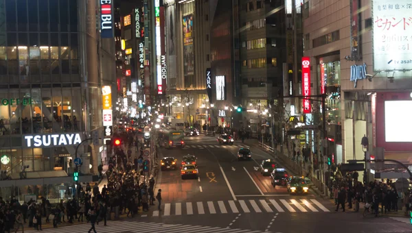 Shibuya city at night with crowd people cross the street at nigh