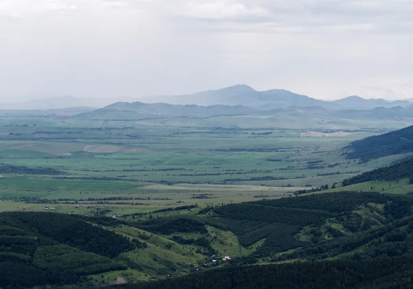 Aerial mountains hills flat land