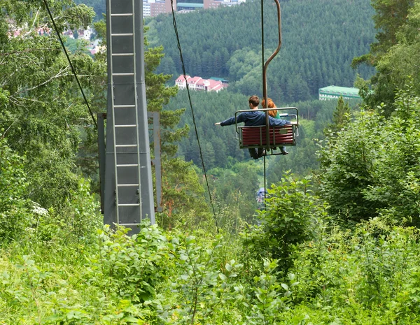 Chair lift couple hikers
