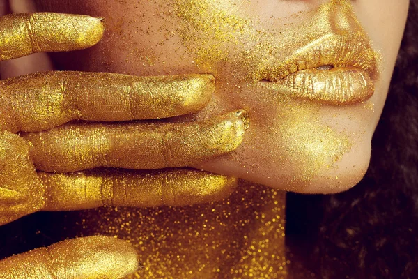 Magic Girl Portrait in Gold. Golden Makeup