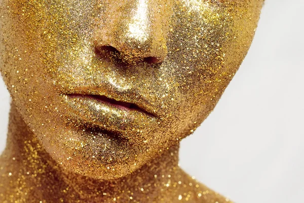 Magic Girl Portrait in Gold. Golden Makeup