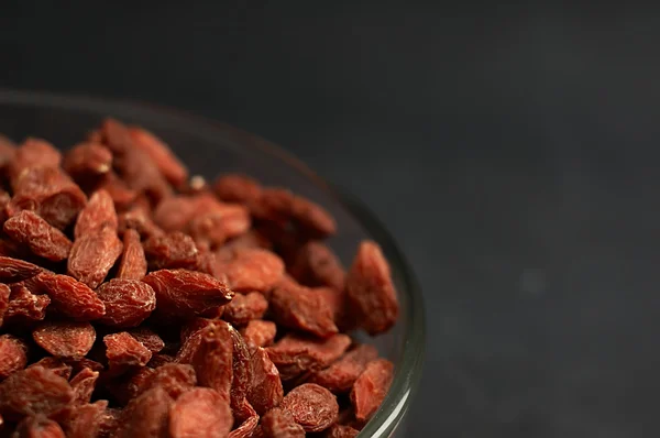 Dried goji berries on the table.