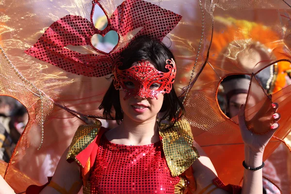 Woman in traditional masquerade costume