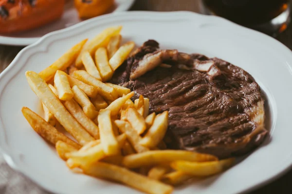 Beef steak with French fries