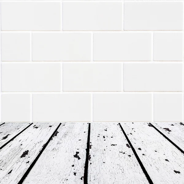 White wooden floor and small white bricks front