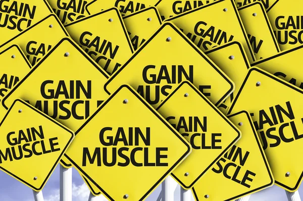 Gain Muscle written on multiple road sign