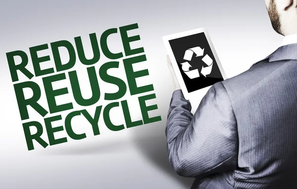 Business man with the text Reduce Reuse Recycle in a concept image