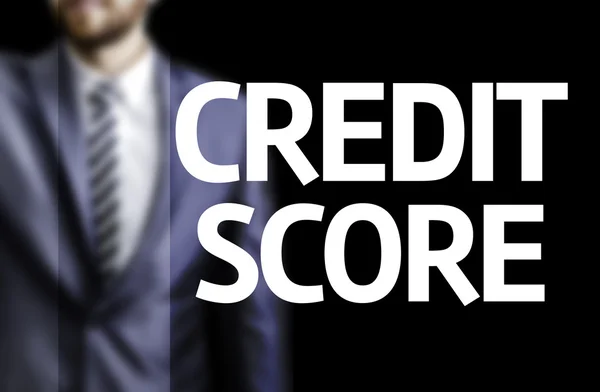 Credit Score written on a board with a business man