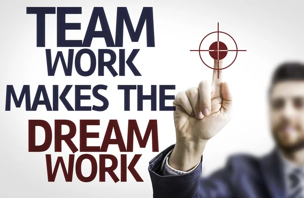 Board with text: Team Work Makes the Dream Work